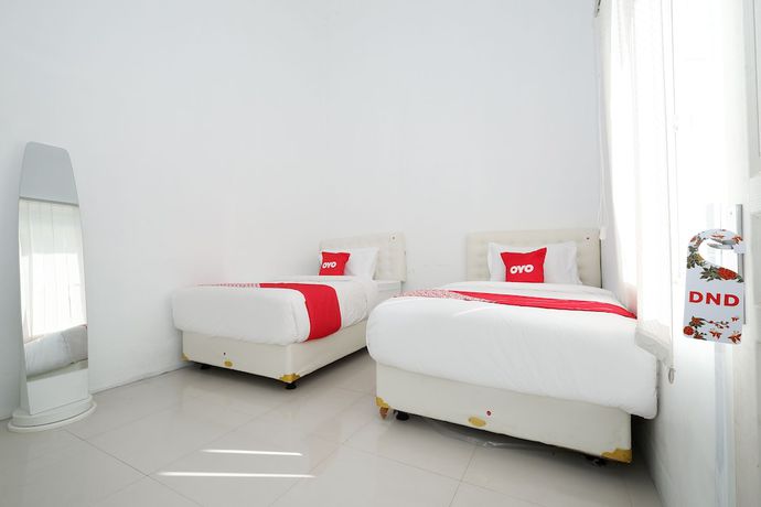 Imagen de la habitación del Hotel OYO 1888 Griya RW Family Guest House. Foto 6