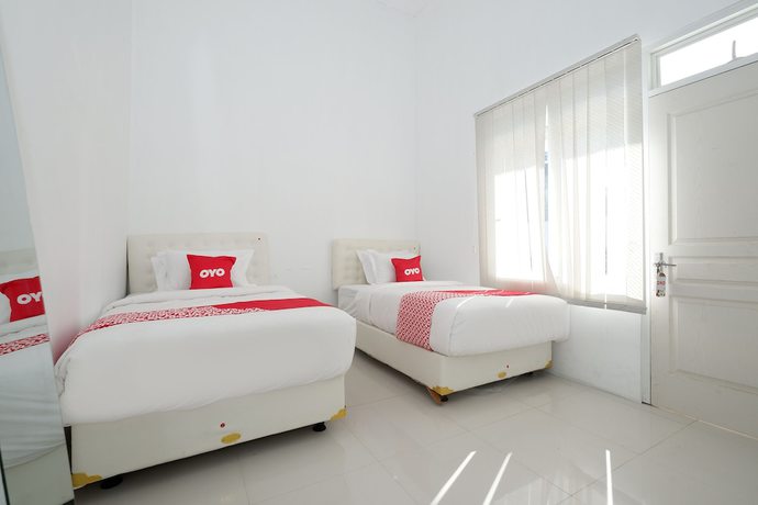 Imagen de la habitación del Hotel OYO 1888 Griya RW Family Guest House. Foto 8
