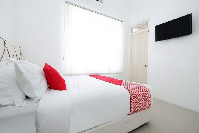 Imagen de la habitación del Hotel OYO 1888 Griya RW Family Guest House. Foto 9