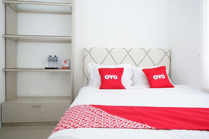 Imagen de la habitación del Hotel OYO 1888 Griya RW Family Guest House. Foto 11