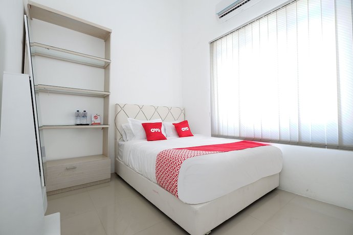 Imagen de la habitación del Hotel OYO 1888 Griya RW Family Guest House. Foto 12