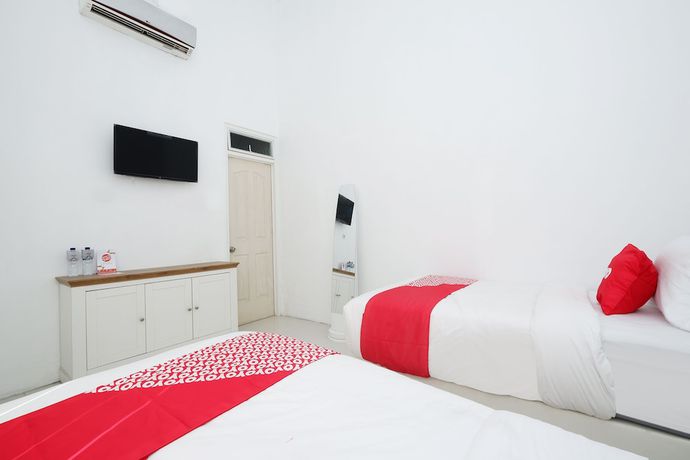 Imagen de la habitación del Hotel OYO 1888 Griya RW Family Guest House. Foto 13
