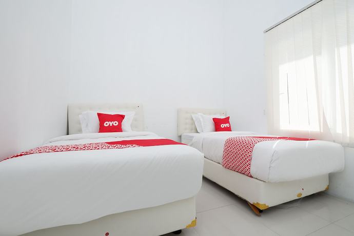 Imagen de la habitación del Hotel OYO 1888 Griya RW Family Guest House. Foto 14