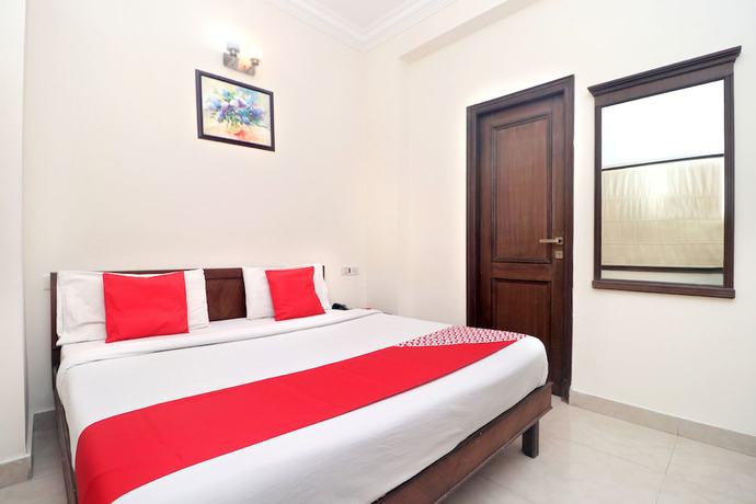 Imagen de la habitación del Hotel OYO 18964 Temple View. Foto 4