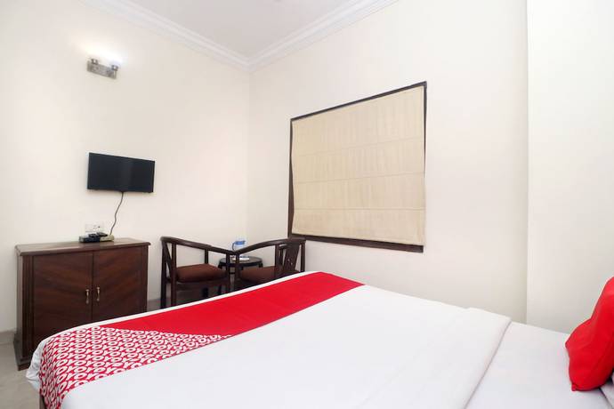 Imagen de la habitación del Hotel OYO 18964 Temple View. Foto 7