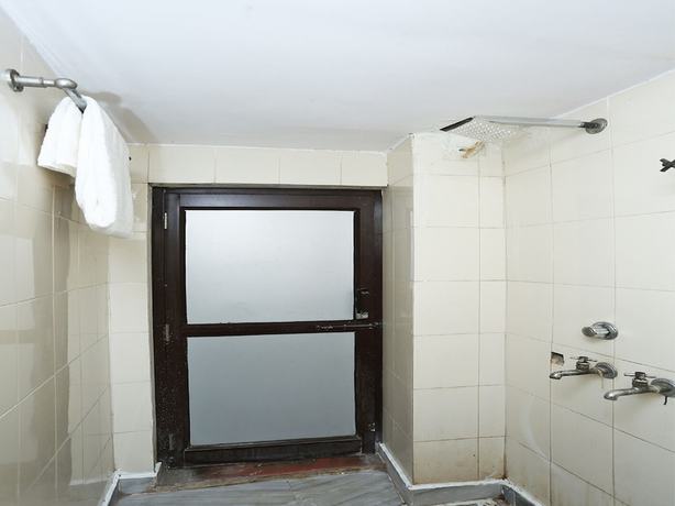 Imagen de la habitación del Hotel OYO 18964 Temple View. Foto 12