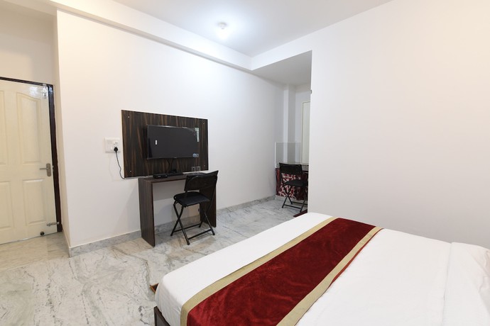 Imagen de la habitación del Hotel OYO 18982 OOAKs Delta 1. Foto 4