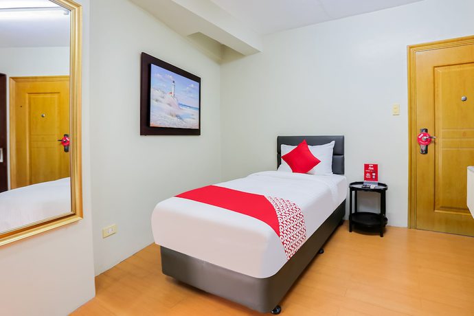 Imagen de la habitación del Hotel OYO 190 Anglo Residences. Foto 4