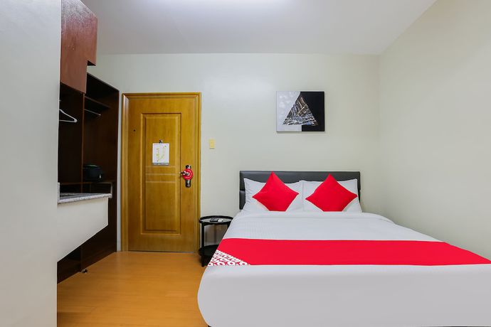 Imagen de la habitación del Hotel OYO 190 Anglo Residences. Foto 9