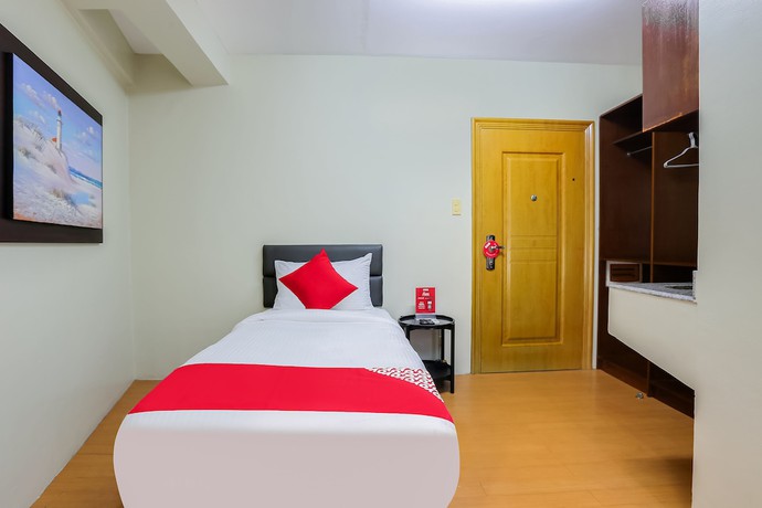Imagen de la habitación del Hotel OYO 190 Anglo Residences. Foto 11