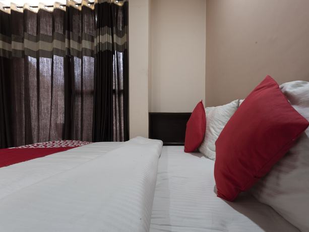 Imagen de la habitación del Hotel OYO 19141 Diamond Vaishali. Foto 11
