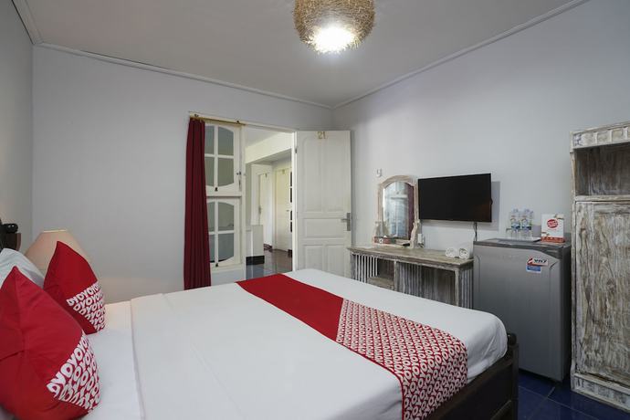 Imagen de la habitación del Hotel OYO 1934 Sedana Inn. Foto 2