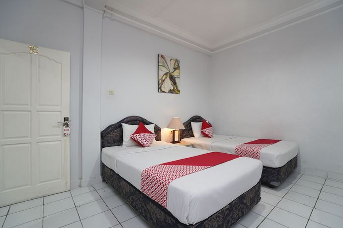 Imagen de la habitación del Hotel OYO 1934 Sedana Inn. Foto 3