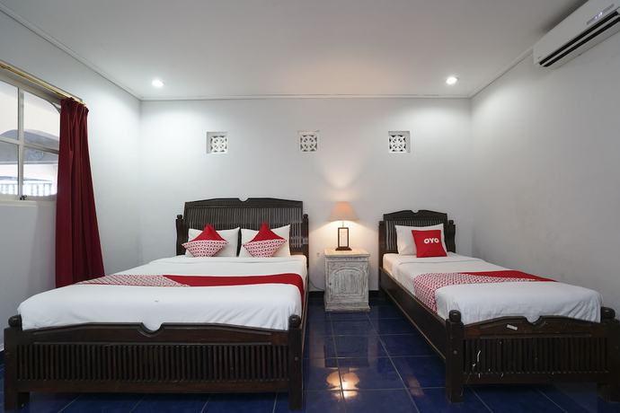 Imagen de la habitación del Hotel OYO 1934 Sedana Inn. Foto 5