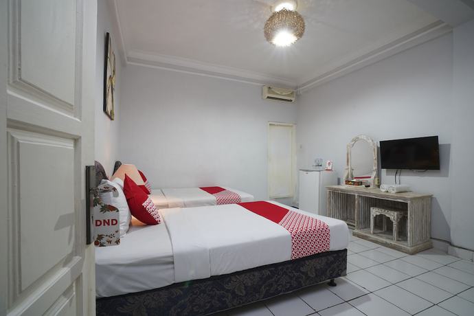 Imagen de la habitación del Hotel OYO 1934 Sedana Inn. Foto 6