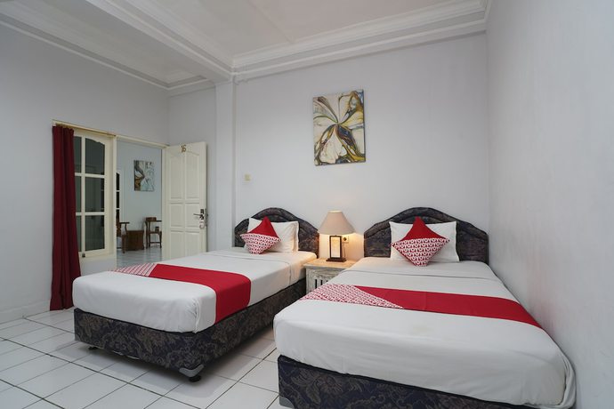 Imagen de la habitación del Hotel OYO 1934 Sedana Inn. Foto 10