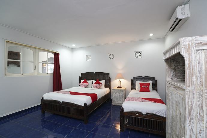 Imagen de la habitación del Hotel OYO 1934 Sedana Inn. Foto 11