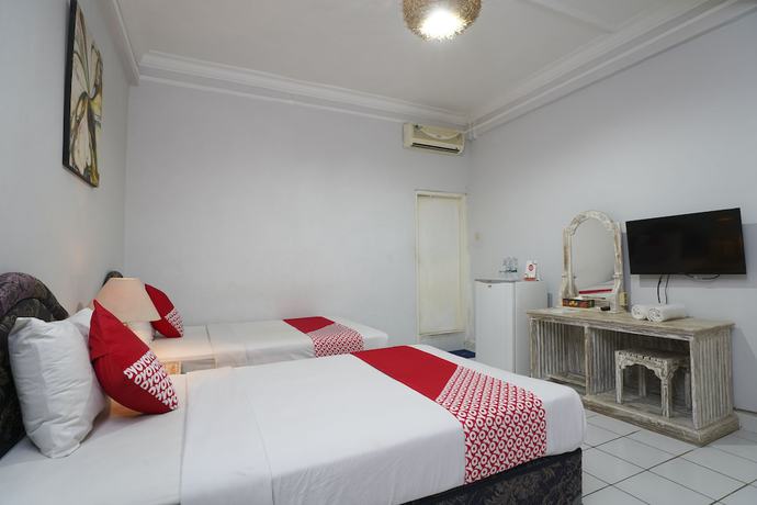 Imagen de la habitación del Hotel OYO 1934 Sedana Inn. Foto 12