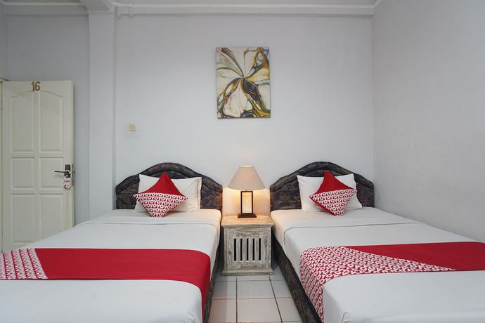 Imagen de la habitación del Hotel OYO 1934 Sedana Inn. Foto 14