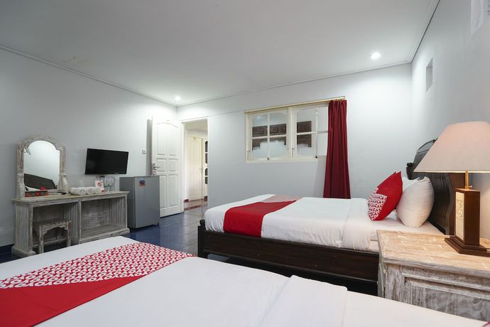 Imagen de la habitación del Hotel OYO 1934 Sedana Inn. Foto 15