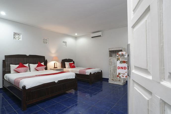 Imagen de la habitación del Hotel OYO 1934 Sedana Inn. Foto 16