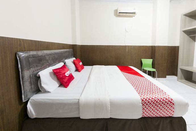 Imagen de la habitación del Hotel OYO 1935 Diamond Inn Makassar. Foto 5
