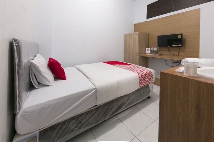 Imagen de la habitación del Hotel OYO 1935 Diamond Inn Makassar. Foto 7