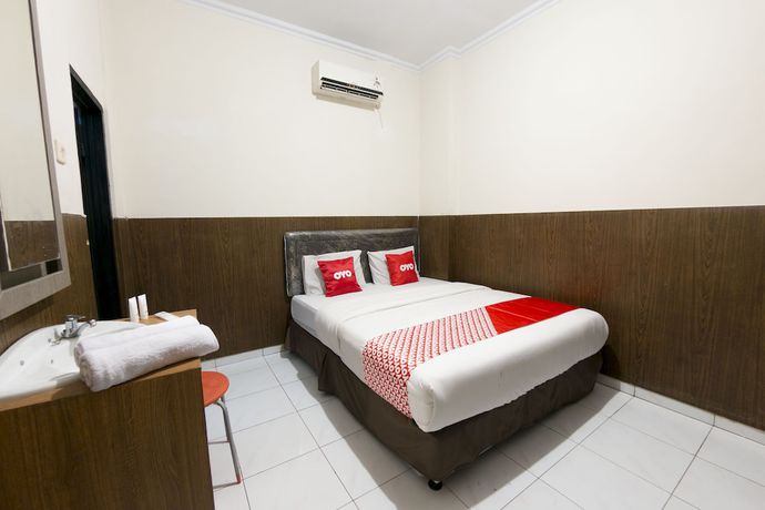 Imagen de la habitación del Hotel OYO 1935 Diamond Inn Makassar. Foto 8