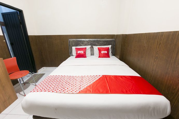 Imagen de la habitación del Hotel OYO 1935 Diamond Inn Makassar. Foto 9