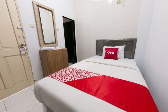 Imagen de la habitación del Hotel OYO 1935 Diamond Inn Makassar. Foto 10