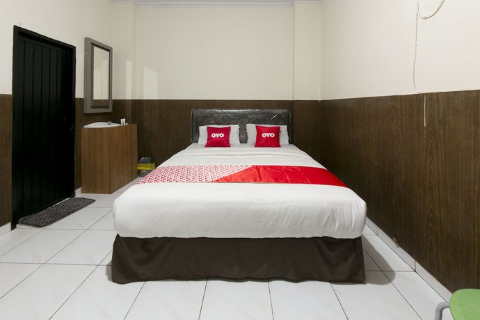 Imagen de la habitación del Hotel OYO 1935 Diamond Inn Makassar. Foto 12