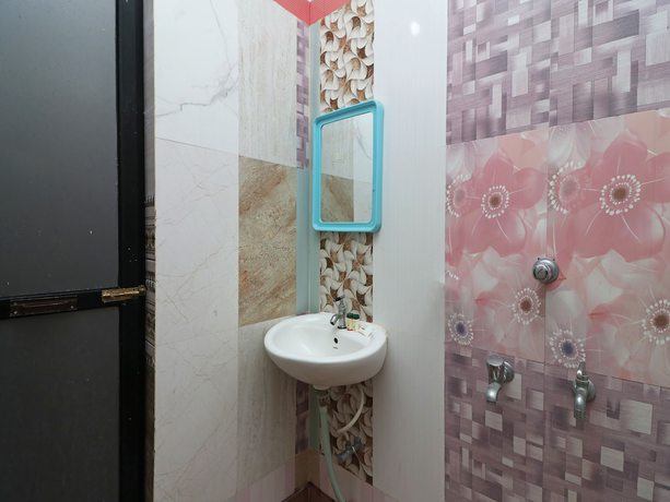 Imagen de la habitación del Hotel OYO 19686 Prantika. Foto 3