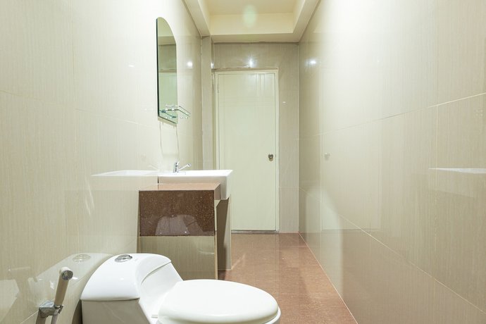 Imagen de la habitación del Hotel OYO 1977 Harvest Residence. Foto 5