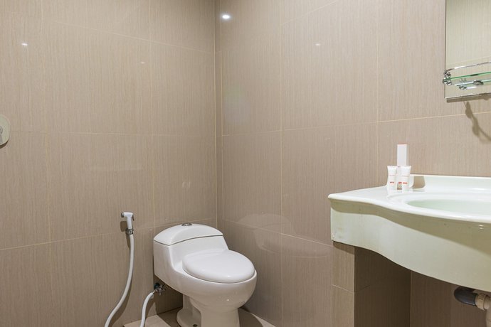 Imagen de la habitación del Hotel OYO 1977 Harvest Residence. Foto 7