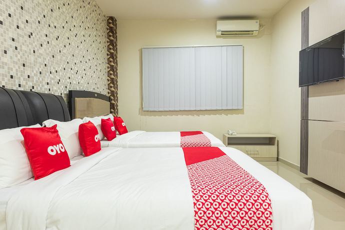 Imagen de la habitación del Hotel OYO 1977 Harvest Residence. Foto 9