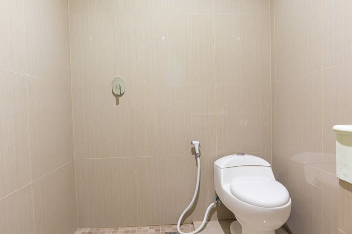 Imagen de la habitación del Hotel OYO 1977 Harvest Residence. Foto 12