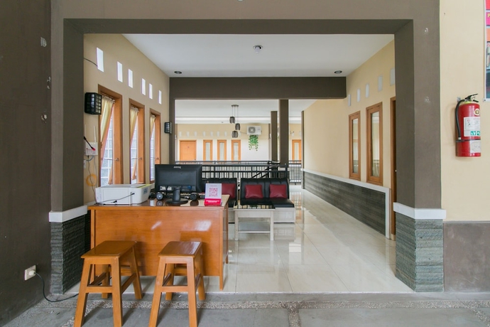 Imagen de los interiores del Hotel OYO 1982 Golf Papa Costel. Foto 17