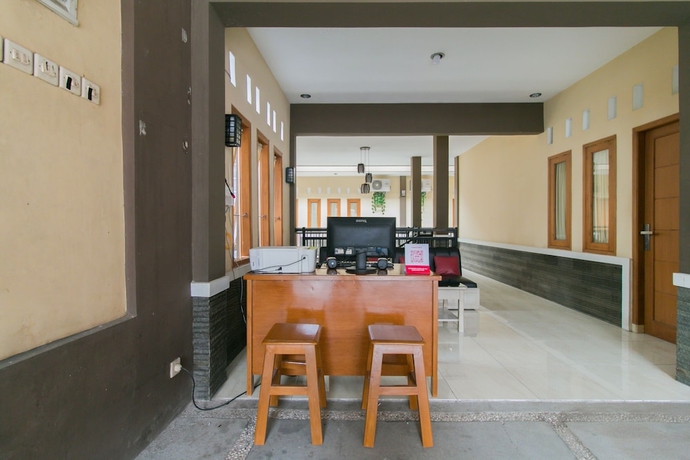 Imagen de los interiores del Hotel OYO 1982 Golf Papa Costel. Foto 18
