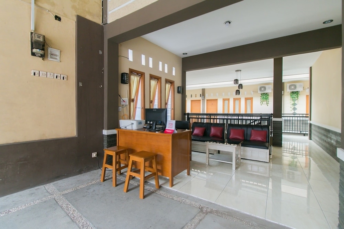 Imagen de los interiores del Hotel OYO 1982 Golf Papa Costel. Foto 19
