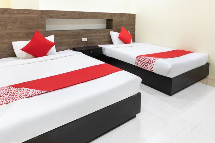 Imagen de la habitación del Hotel OYO 202 JRJF Annex. Foto 7