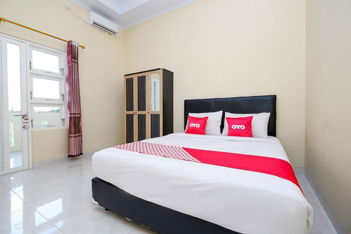 Imagen de la habitación del Hotel OYO 2058 Griya Ria. Foto 3