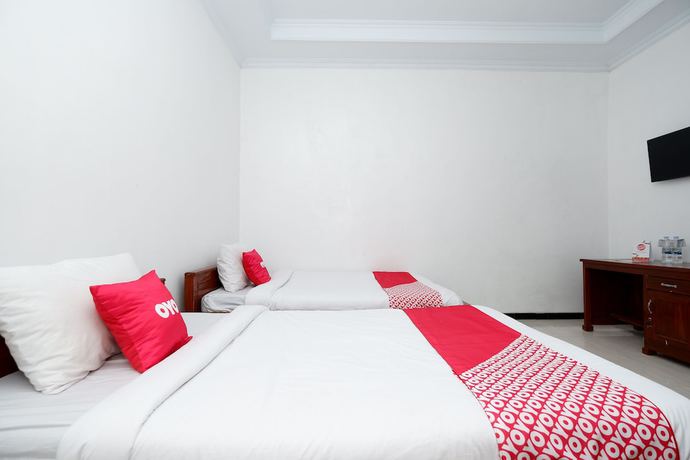 Imagen de la habitación del Hotel OYO 2058 Griya Ria. Foto 5