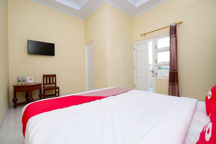 Imagen de la habitación del Hotel OYO 2058 Griya Ria. Foto 6