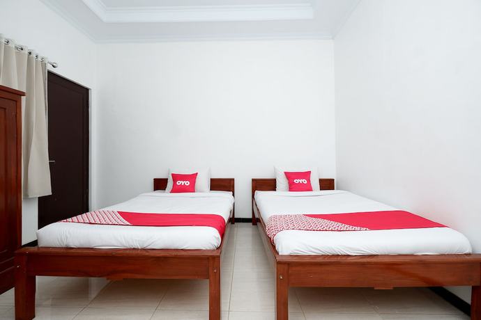 Imagen de la habitación del Hotel OYO 2058 Griya Ria. Foto 7