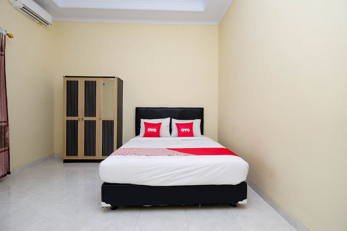 Imagen de la habitación del Hotel OYO 2058 Griya Ria. Foto 8