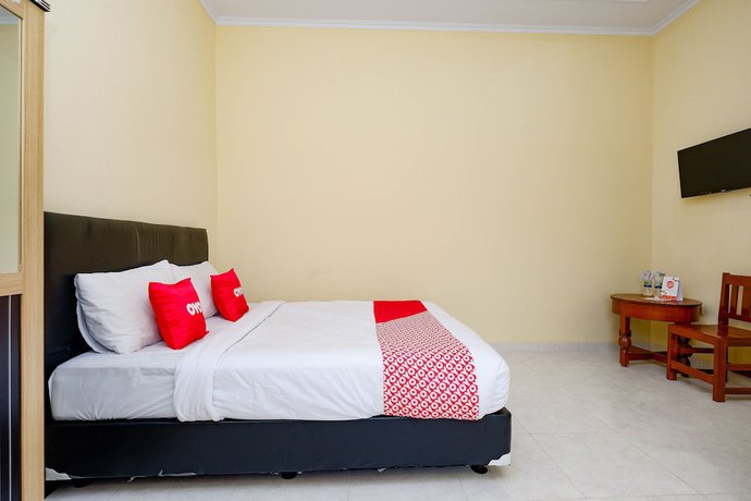 Imagen de la habitación del Hotel OYO 2058 Griya Ria. Foto 11