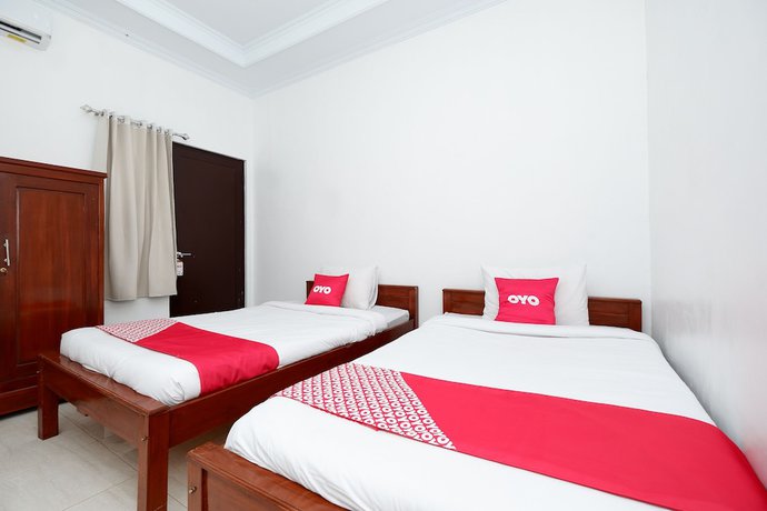 Imagen de la habitación del Hotel OYO 2058 Griya Ria. Foto 12