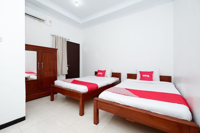 Imagen de la habitación del Hotel OYO 2058 Griya Ria. Foto 13