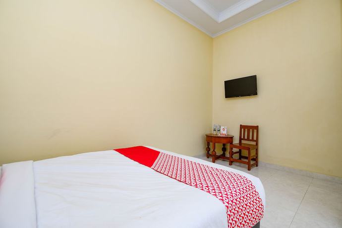 Imagen de la habitación del Hotel OYO 2058 Griya Ria. Foto 14