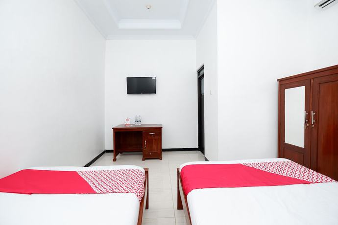 Imagen de la habitación del Hotel OYO 2058 Griya Ria. Foto 15